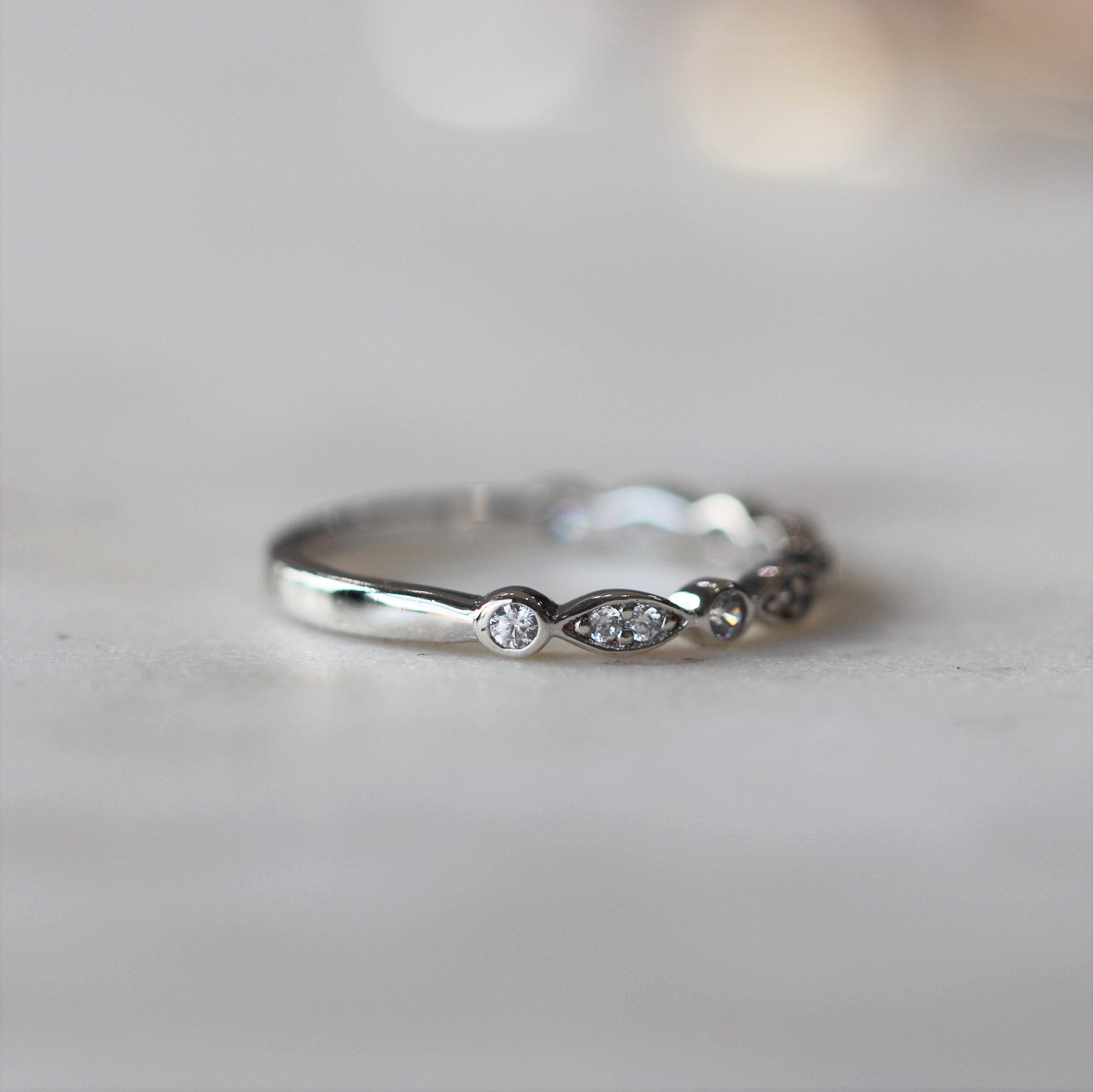 0.17 Carats Moissanite Round Shape Curved Wedding Band