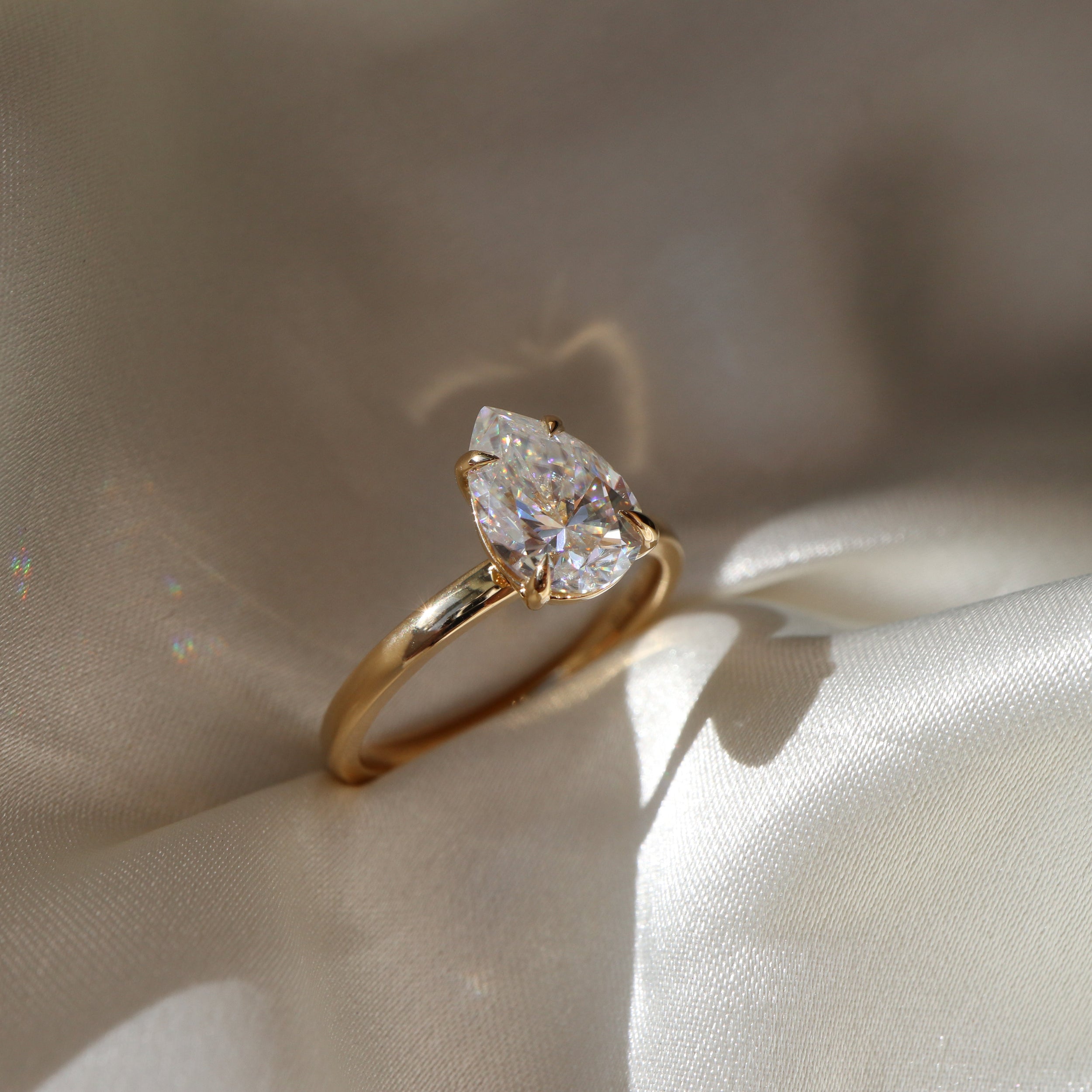 1.30 Carats Pear Shape Solitaire Moissanite Engagement Ring