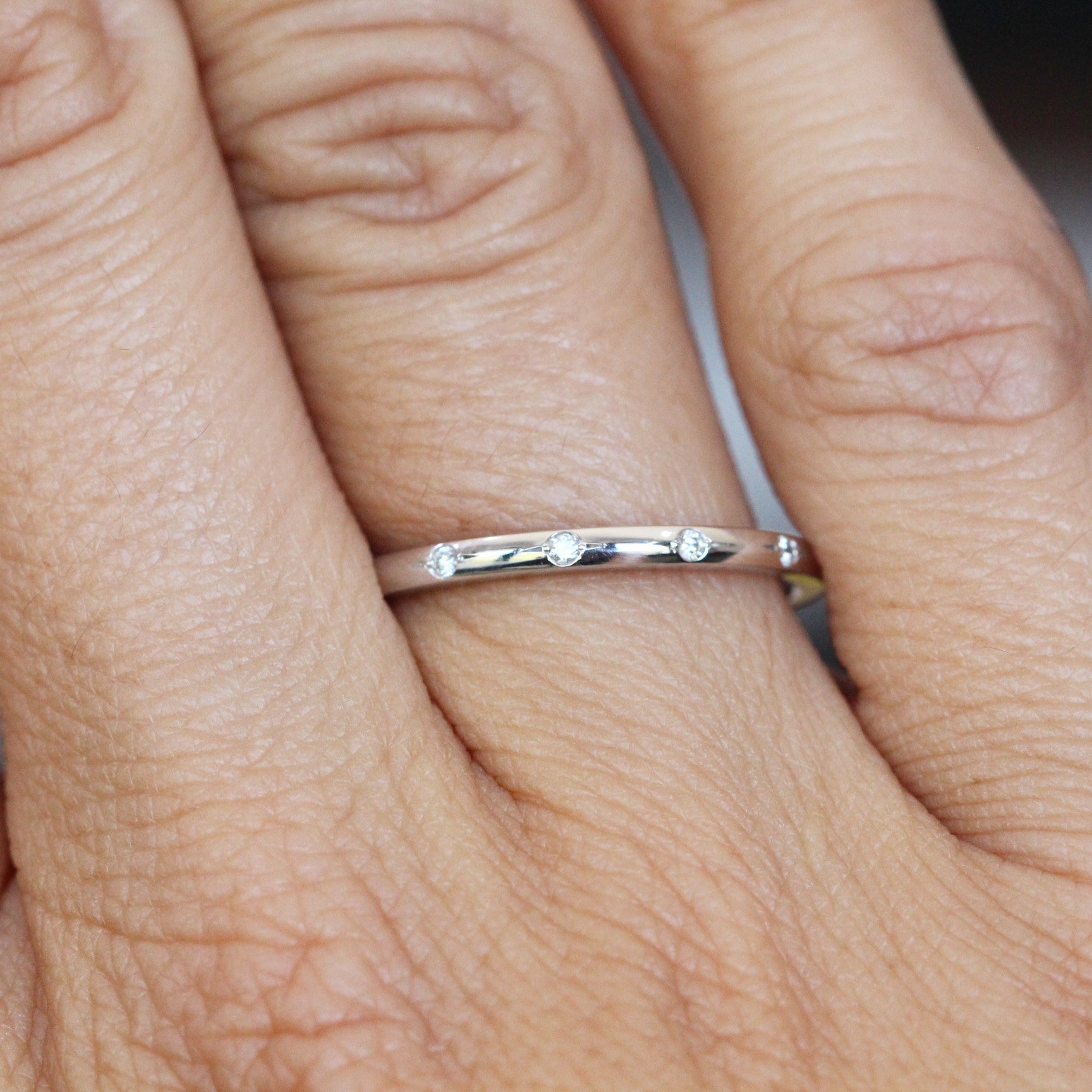 0.15 Carats Moissanite Round Shape Flush Wedding Band