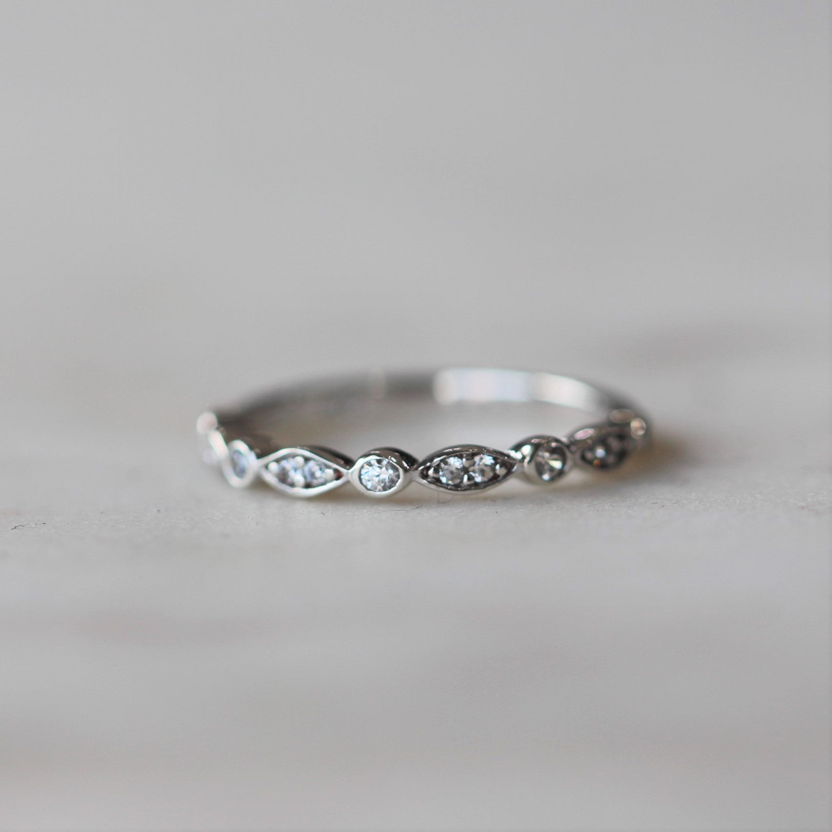 0.17 Carats Moissanite Round Shape Curved Wedding Band