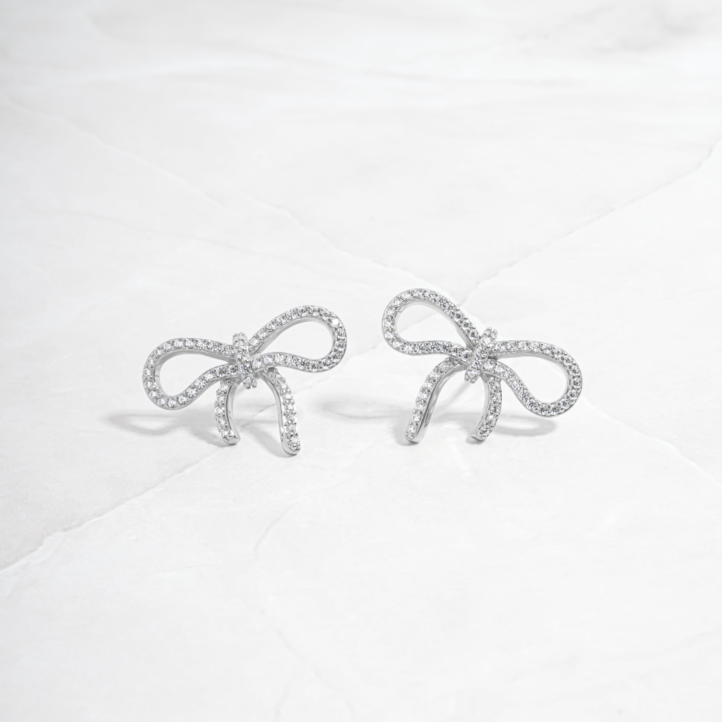 1.0 TCW Round Shape Moissanite Bow Stud Earrings